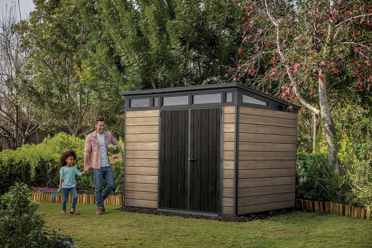 Keter Signature Collection 9x7 Ft All-Weather Storage Shed with Skylight, Window, Built-in Ventilation, Customizable Walls, & Lockable Double Doors, Ashwood
